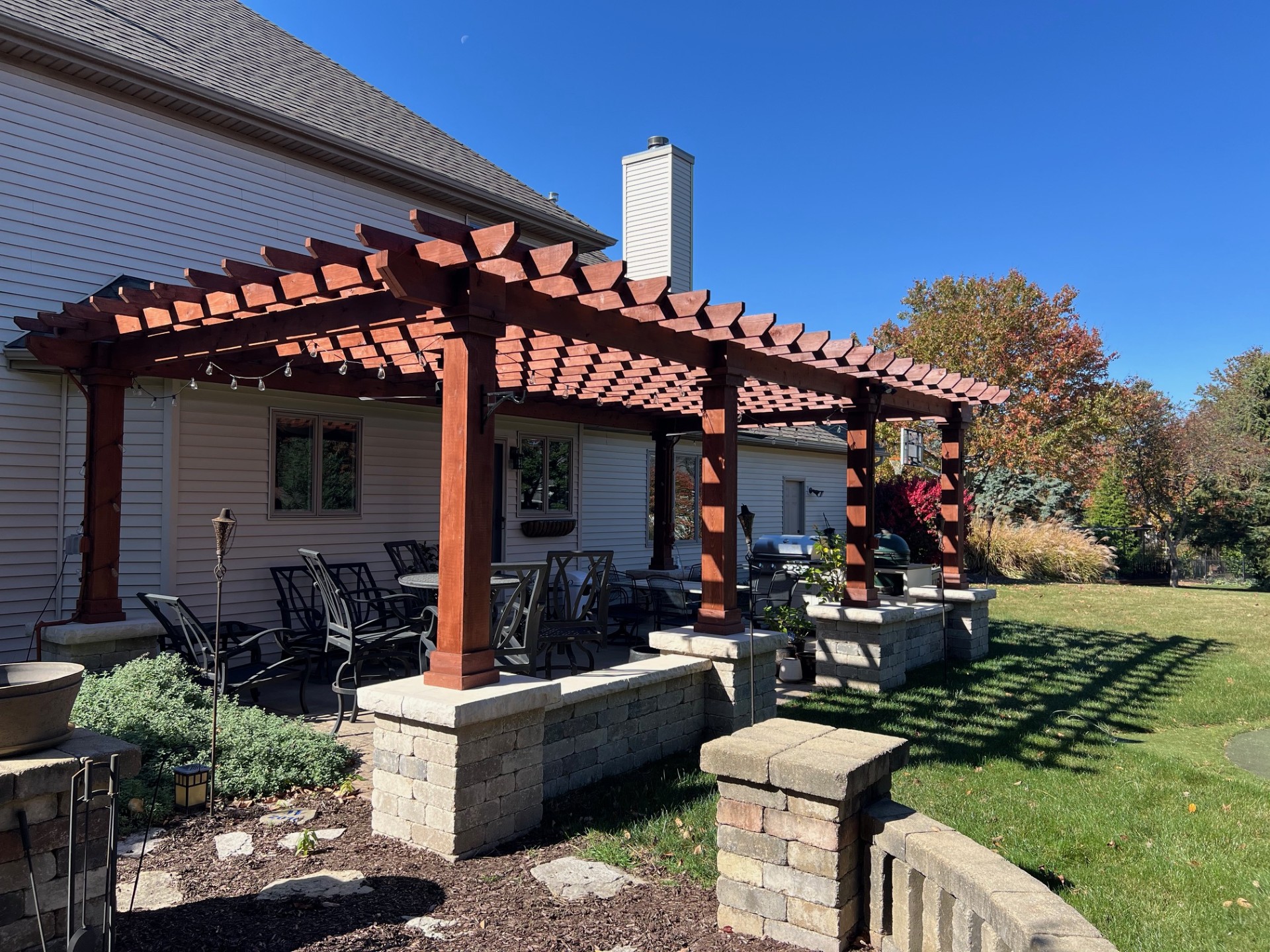 residential stained pergola installed in Bloomington Illinois